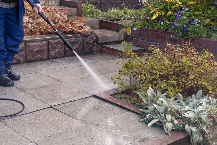 man-washes-garden-path-with-high-pressure-washer-autumn-work-garden_332246-699 pressure washing services in Australia